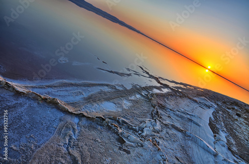 Beautiful sunrise on salt lake Chott el Djerid, Sahara desert, T photo