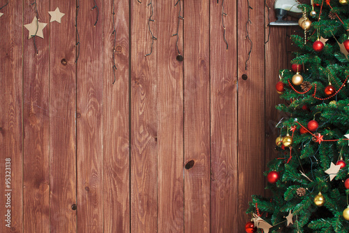 Christmas tree on wooden background
