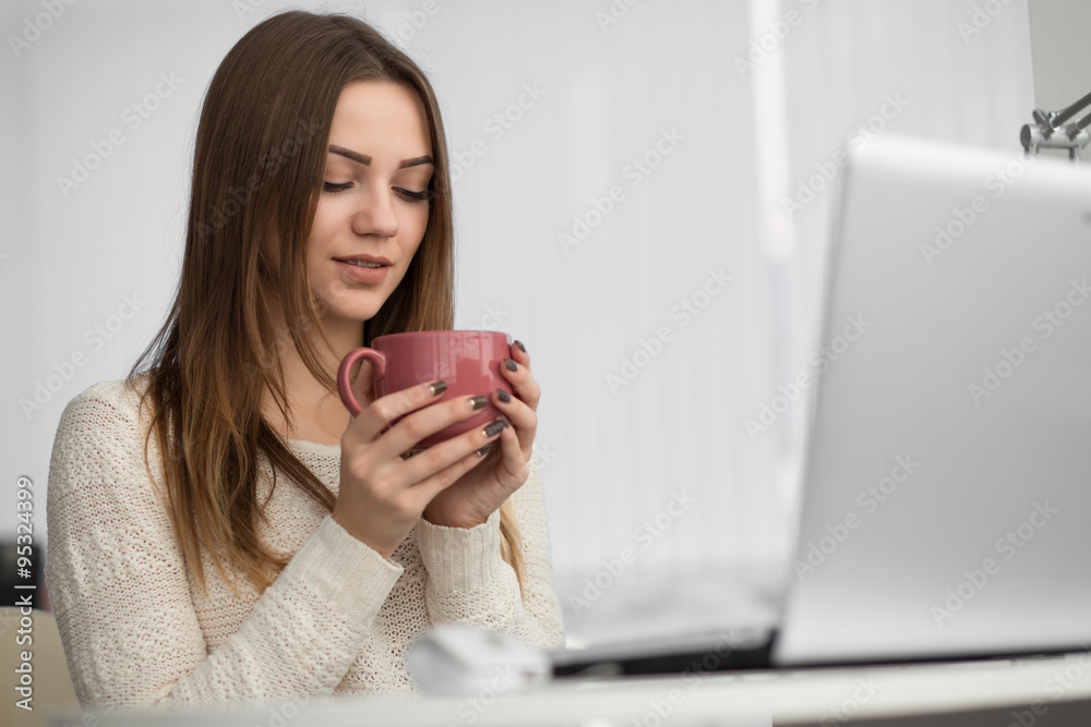 Office worker. Female sitting at her workstation. She make break. Office worker. Female sitting at her workstation. She make break.
