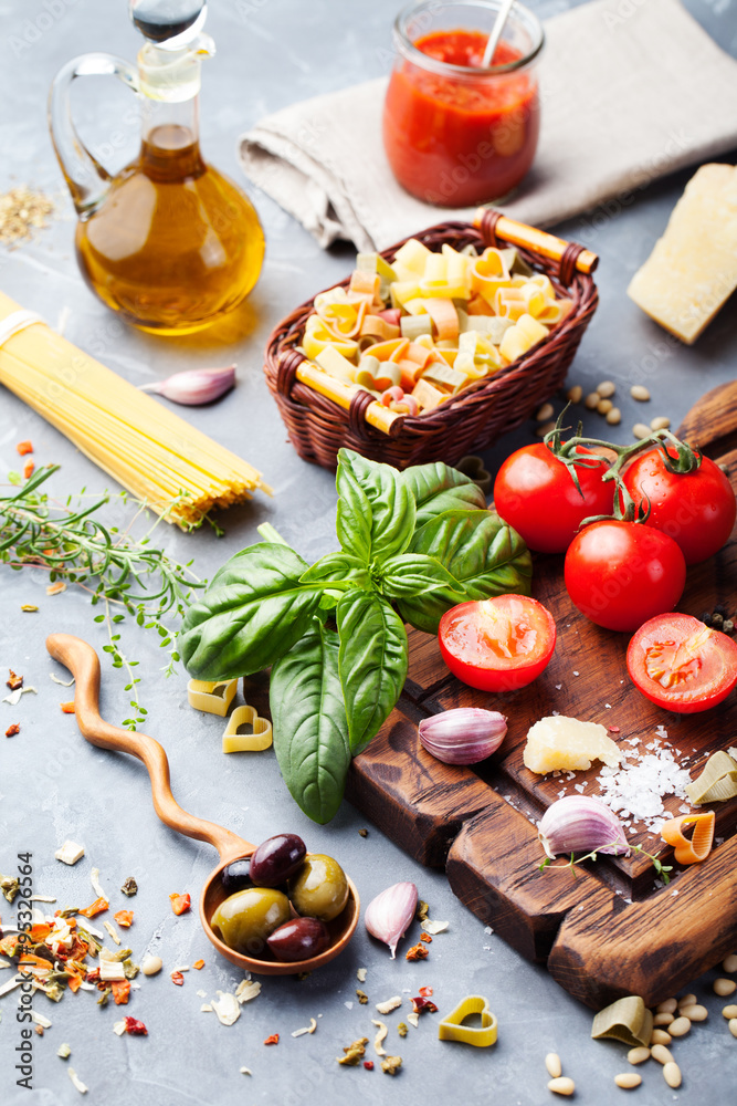 Italian food , tomatoes, basil, spaghetti, olives, parmesan. Italian food , tomatoes, basil, spaghetti, olives, parmesan.