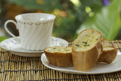 Garlic bread with cup of tea