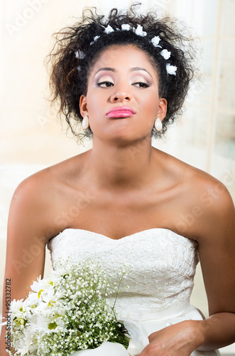 Fotografija Portrait of beautiful exotic emotional bride looking bored