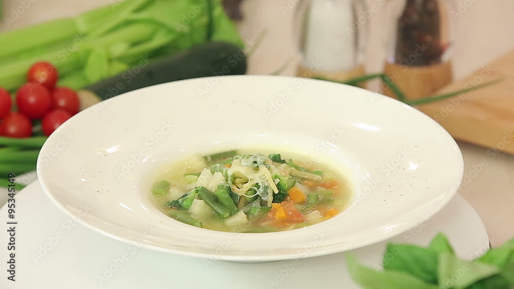 A plate of hot vegetable soup presentation A plate of hot vegetable soup presentation