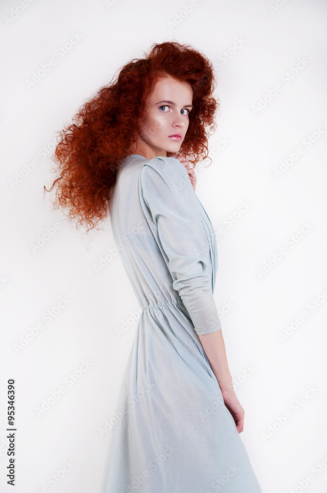 Beautiful fragile redheaded girl with blue eyes and pale skin Beautiful fragile redheaded girl with blue eyes and pale skin