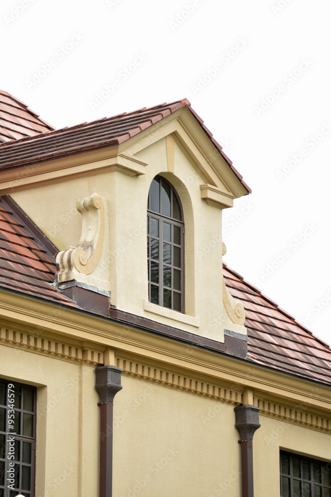 Stucco building with dormer in park, Gainesville, Florida