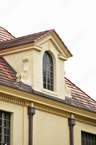 Stucco building with dormer in park, Gainesville, Florida