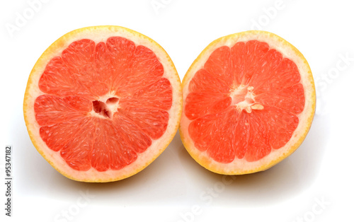Grapefruit half cut isolated on white background