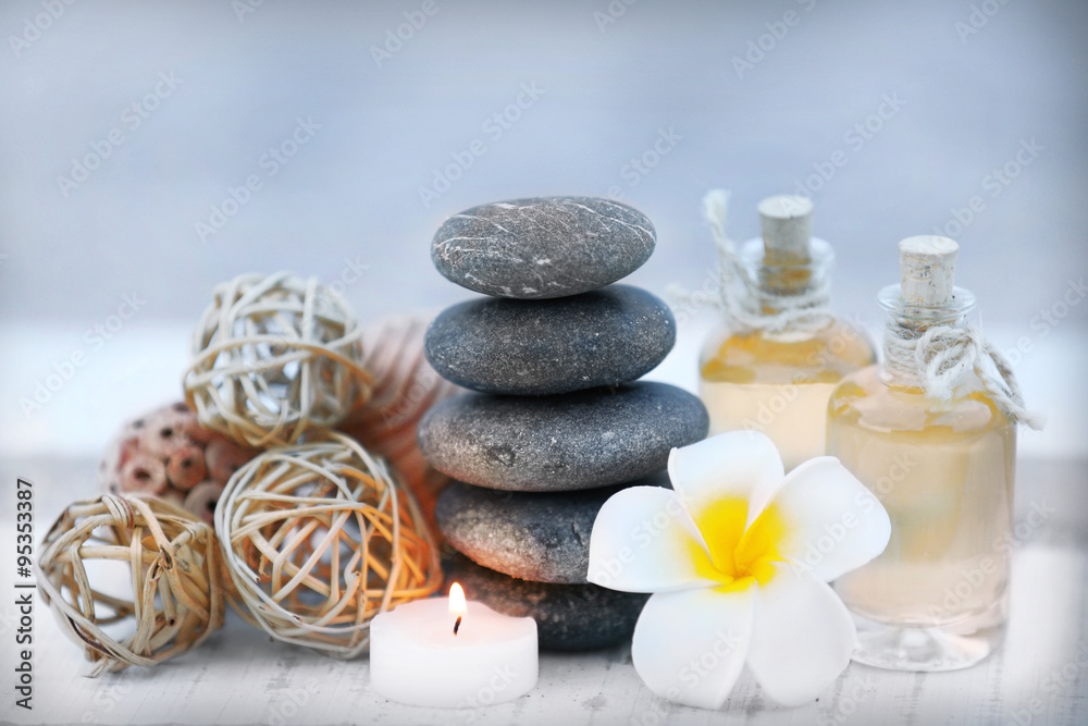 Composition of wattled balls, pebbles and flower Composition of wattled balls, pebbles and flower