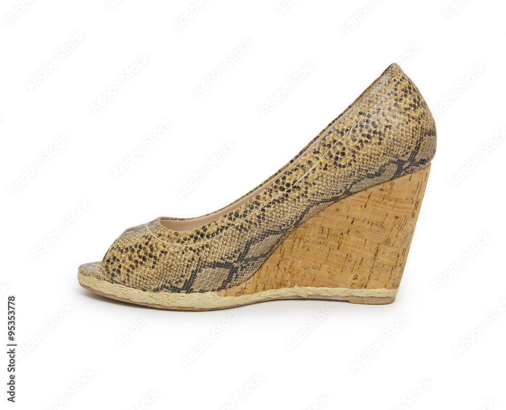 Obraz premium Biege high heel shoes isolated on white