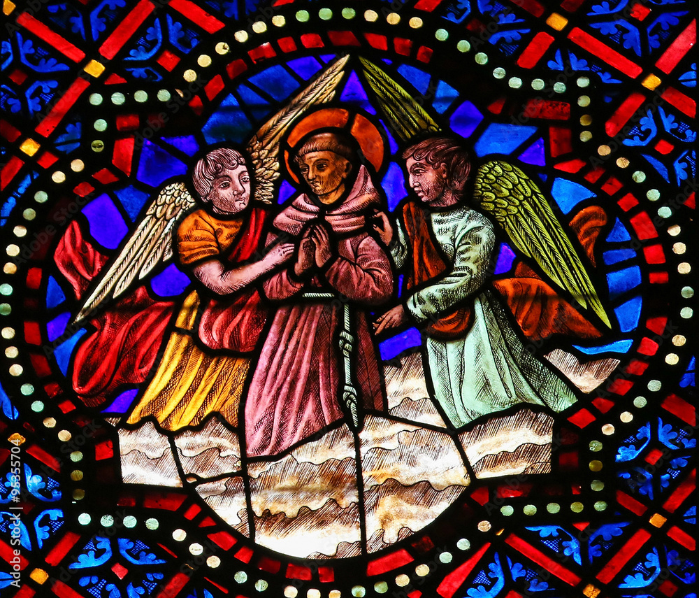 Stained Glass of a Catholic Saint and Angels in Cathedral of Leo