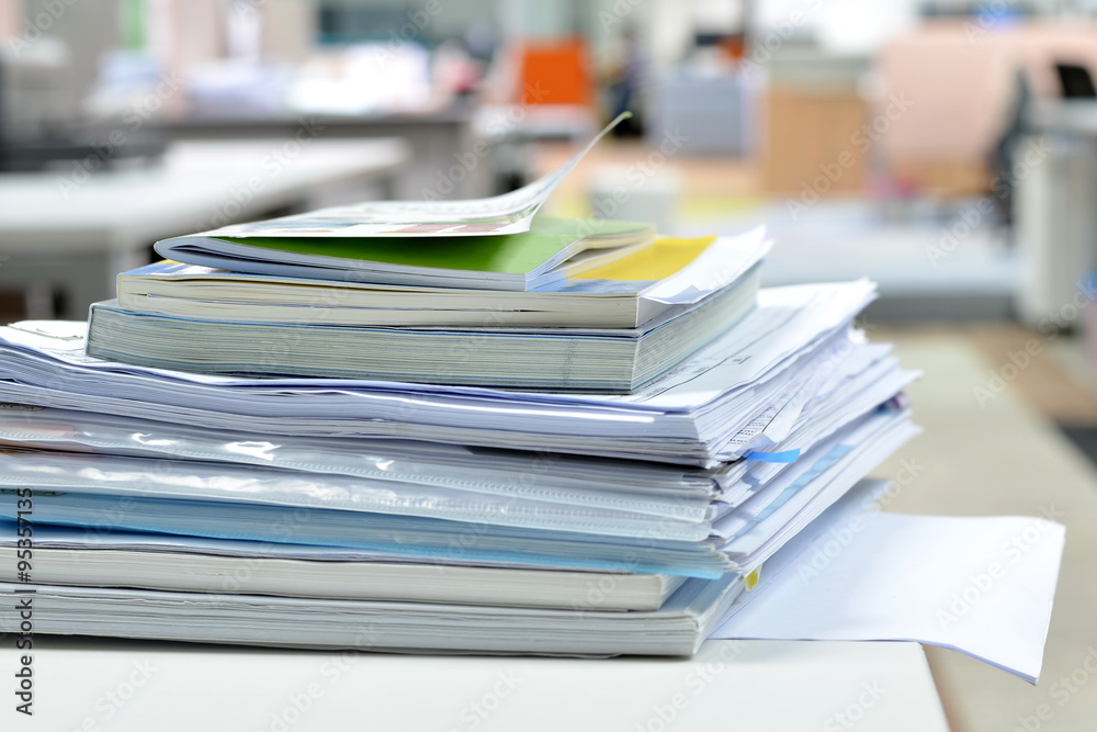 Documents on desk/documents on desk at business office. Documents on desk/documents on desk at business office.