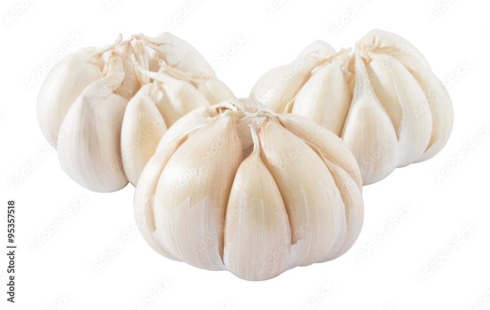 Three Garlic Bulbs and Garlic Cloves on White Background Three Garlic Bulbs and Garlic Cloves on White Background