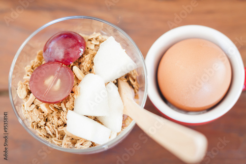 Granola with fruits and boiled egg