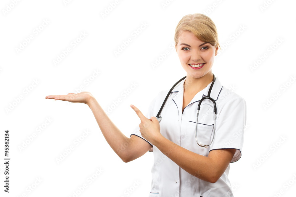 Woman doctor with stethoscope showing empty hand, copy space for text, healthcare concept Woman doctor with stethoscope showing empty hand, copy space for text, healthcare concept