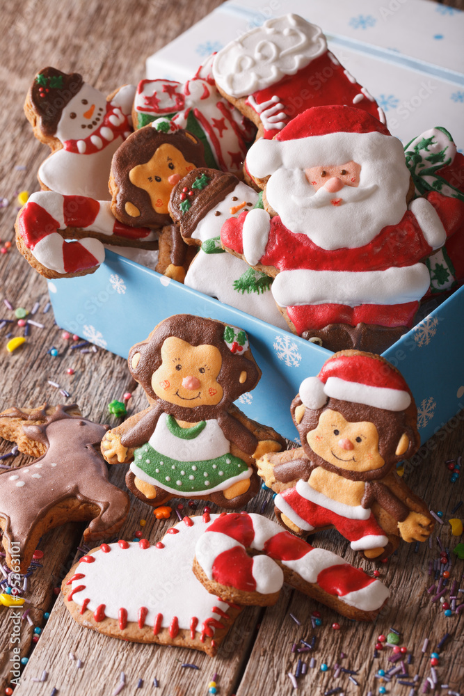 Christmas gingerbread cookies in a gift box closeup. vertical 
