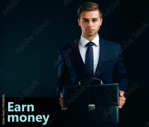 Elegant man in suit with br...