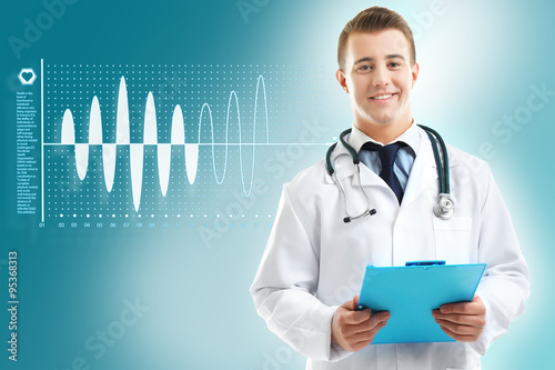 Male Doctor holding clipboard