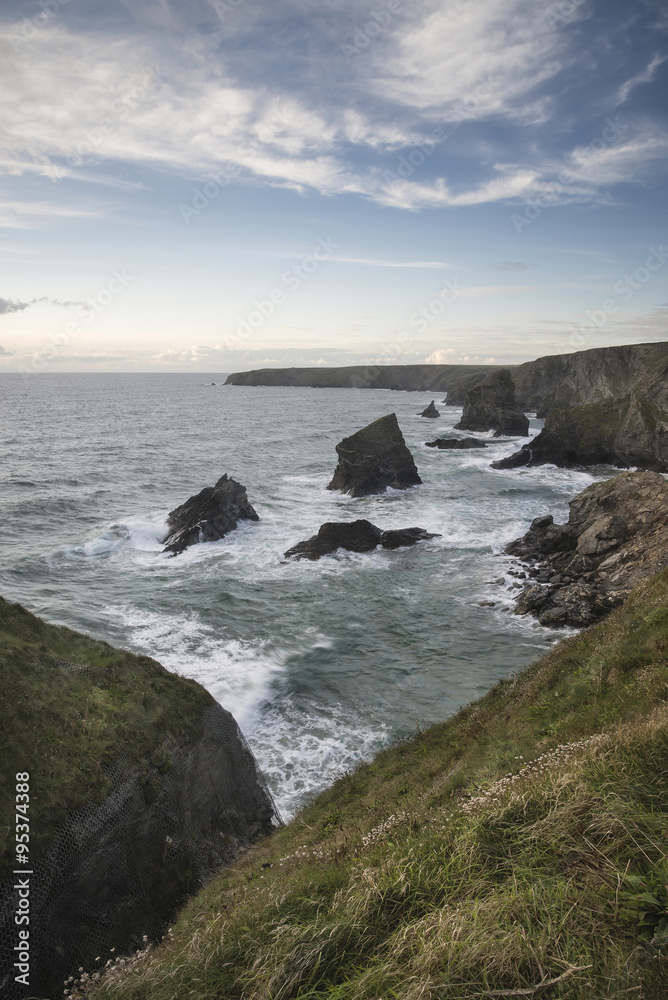 Stunning landcape image of Bedruthan Steps on Cornwall coast in Stunning landcape image of Bedruthan Steps on Cornwall coast in