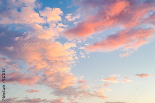 Sunset or dawn sky with pink and orange clouds