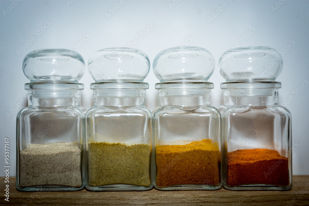 White yellow orange and red ingredients on the wooden shelf White yellow orange and red ingredients on the wooden shelf