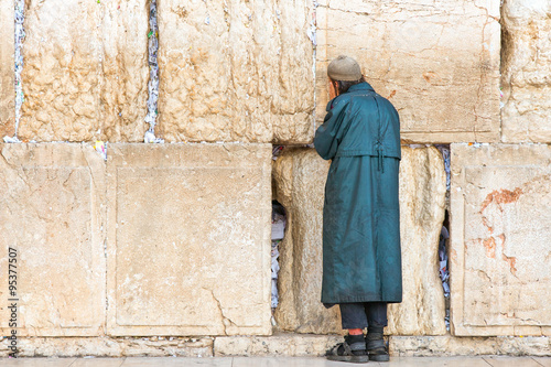 Israel, Jerusalem,a poor jewish faithful in prayer at the western wall