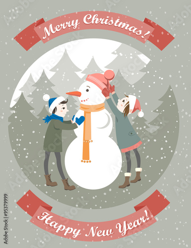 Boy and girl building snowman