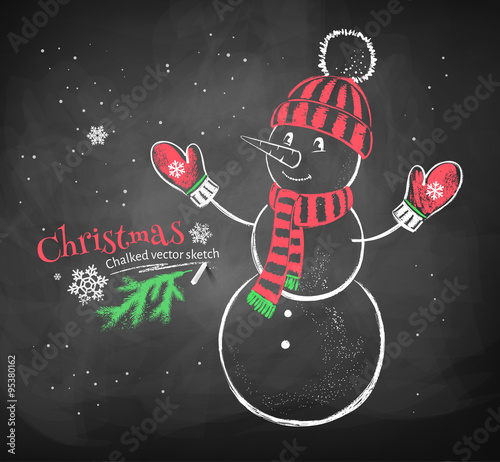 Cute snowman wearing knittted hat.