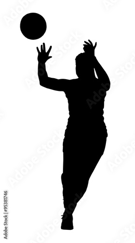 Silhouette of korfball ladies league girl player catching ball photo