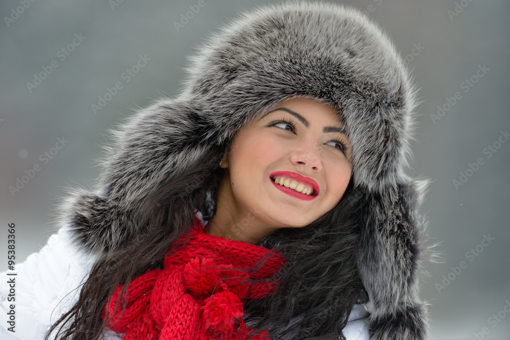 beautiful female in luxurious fur head cloth outdoor in winter beautiful female in luxurious fur head cloth outdoor in winter