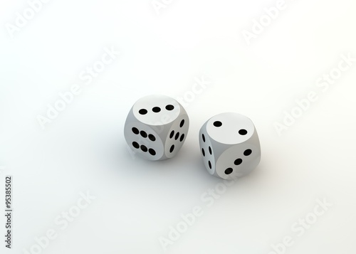 Two white dice thrown to reveal the values three and two