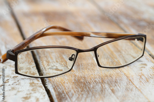 Glasses on rustic wooden surface 