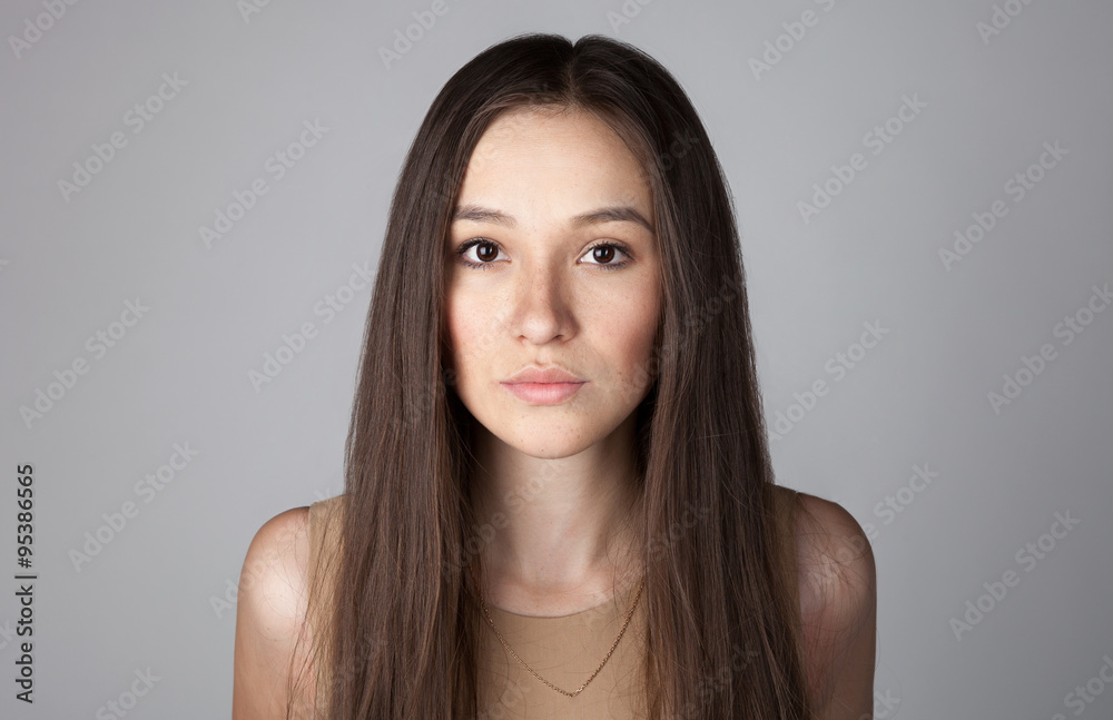 Beautiful young lady closeup portrait. Beautiful young lady closeup portrait.