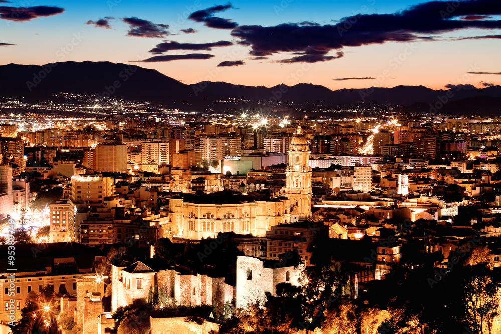 Obraz premium View over Malaga at night Andalusia Spain