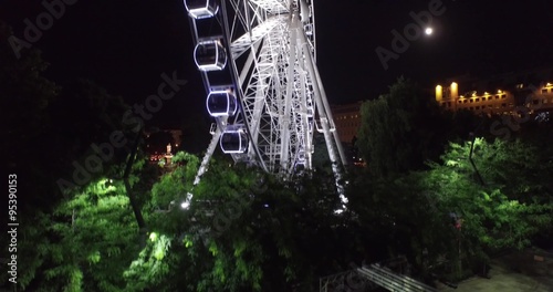 Budapest eye – the  Giant Ferris Wheel in the moon light. (Aerial) photo