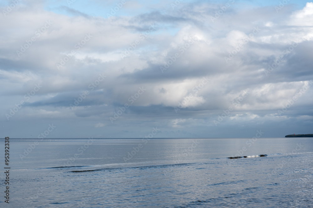 Obraz premium Clouds over baltic sea.