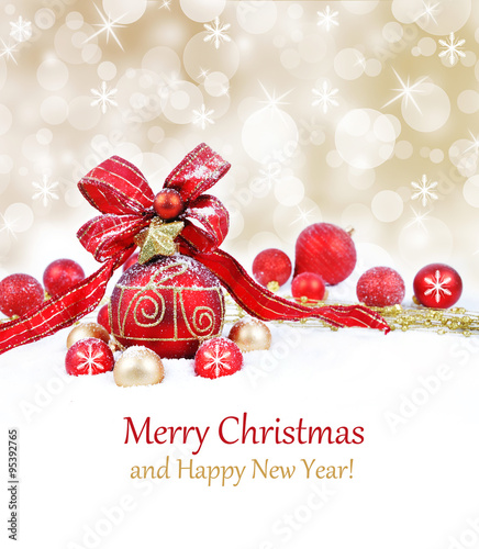 Colorful christmas decoration baubles on white with space for text