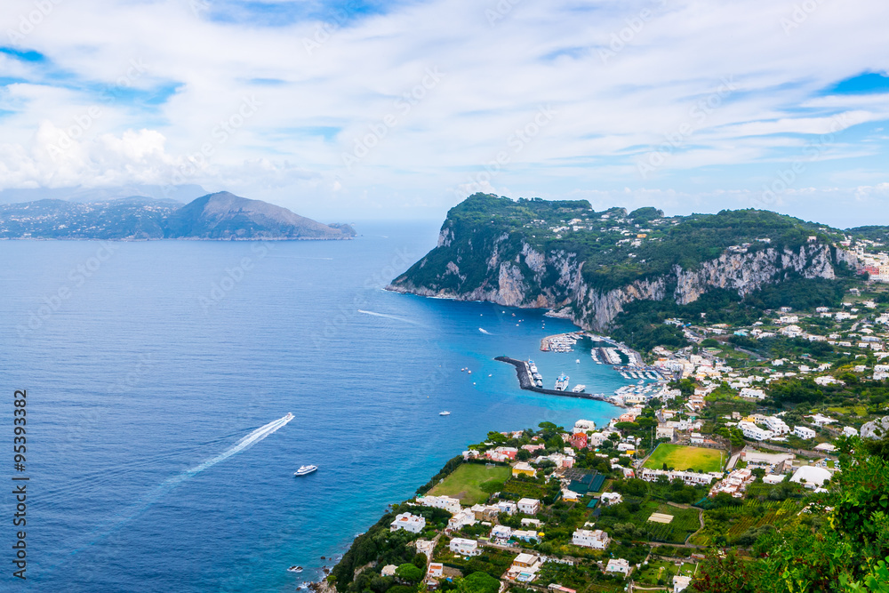Capri Island, Faraglioni cliffs panorama,and the stunning Tyrrhenian sea,Campania, Amalfitana, Italy,Europe. Sunny summer view from the top point