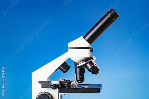 Educational microscope on blue