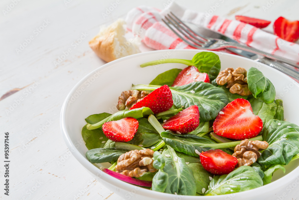 Strawberry salad in white bowl Strawberry salad in white bowl
