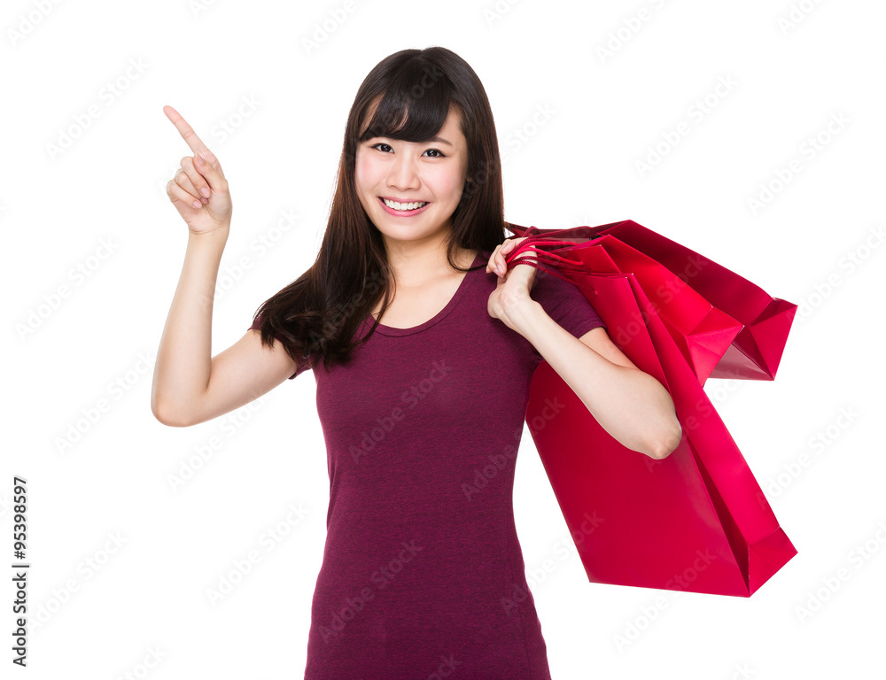 Asian Woman hold with present box and finger point up Asian Woman hold with present box and finger point up