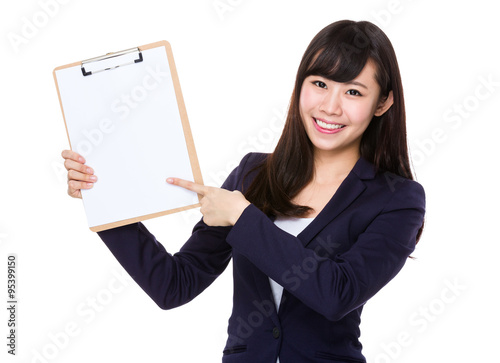 Asian businesswoman showing with clipboard