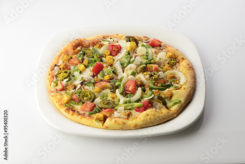 Pizza with Vegetable topping shot in studio 