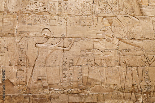 bas-relief on the wall of the ancient temple of Karnak in Luxor