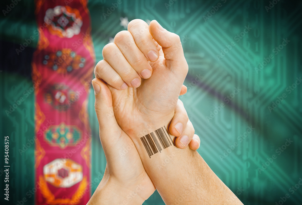 Barcode ID number on wrist and national flag on background - Turkmenistan