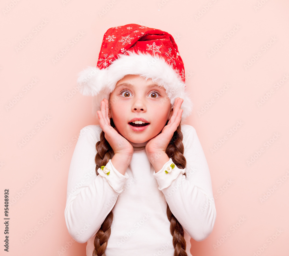 girl with pigtails in Santa Claus girl with pigtails in Santa Claus