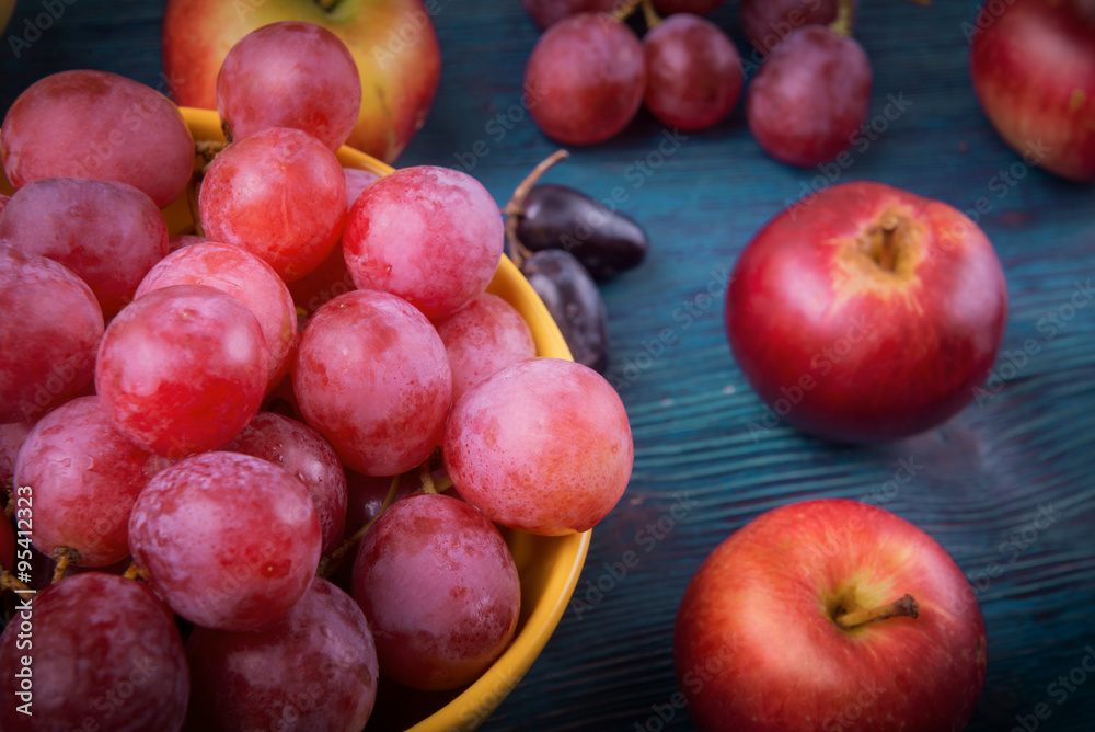 Close up of bunch of grapes and apples Close up of bunch of grapes and apples