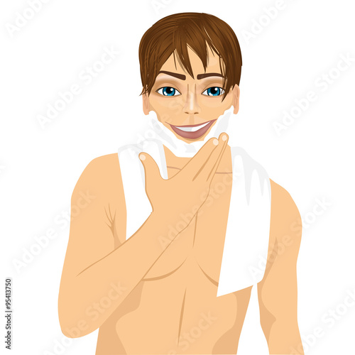 young man applying shaving cream foam