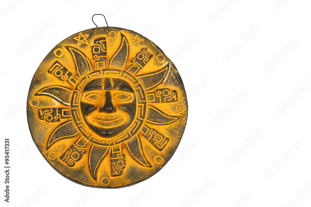 Mexican yellow ceramic sun souvenir isolated on white