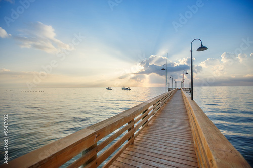 Wooden pier and boardwalk over ocean