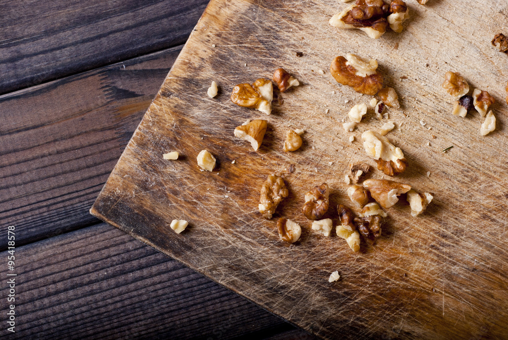 Fototapeta premium walnuts on wooden background